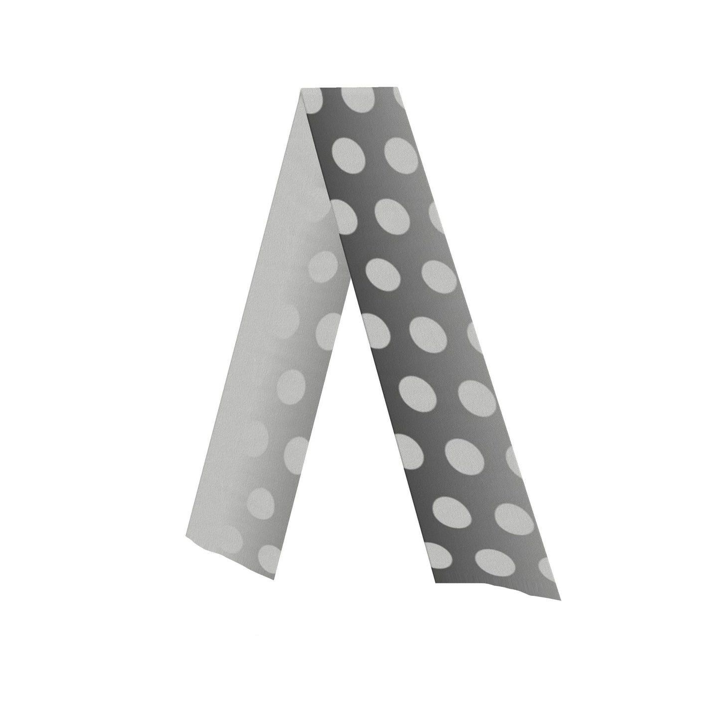 A gray and white polka dot silk twill skarf shaped displayed on a solid white background.